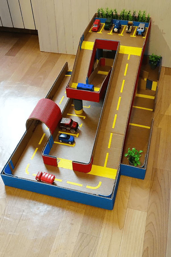 A cardboard ramp for racing toy cars