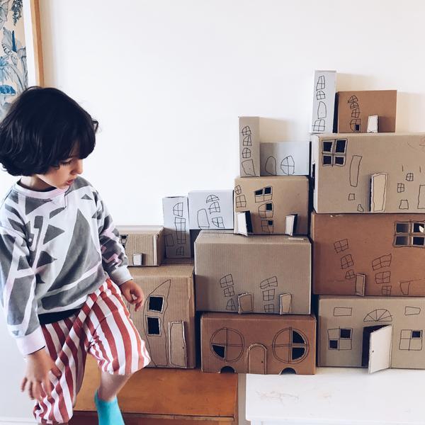 up-cycled craft project making a cardboard box city