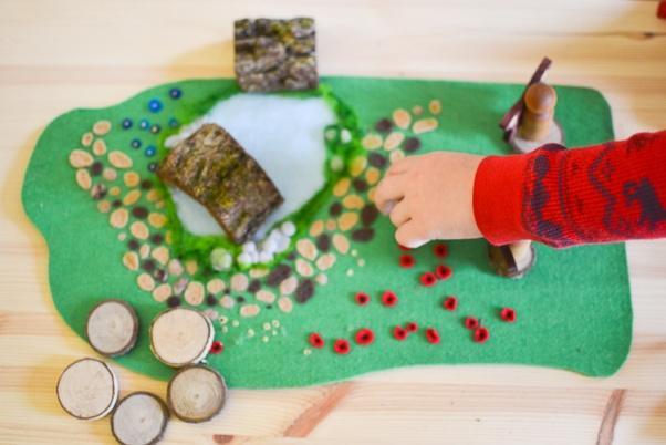 Woodland Meadow DIY No-Sew Felt Play Mat: Use this mat with different natural elements to create an enchanting Waldorf-inspired fairy world in your playroom!