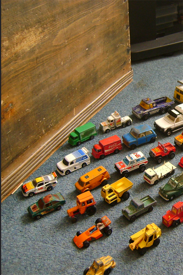 Positioning schema play represented through lined up toy cars