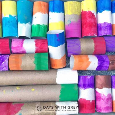 Collection of toilet paper rolls with colorful paint on either end.