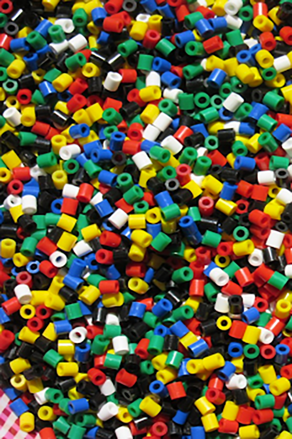 Plastic beads allow children to engage in positioning schema play