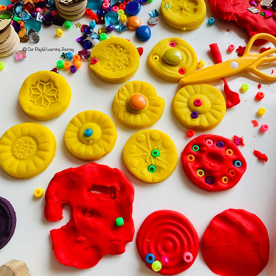 Invitation to play with playdough and loose parts