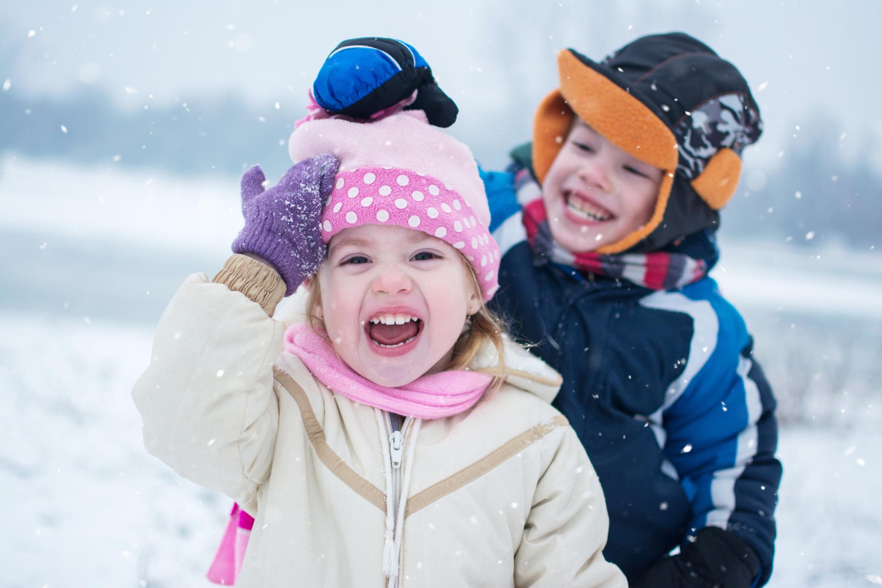 Children Bundled Up In Snow
