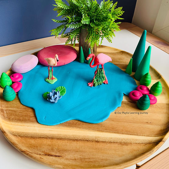 Playdough small world with flamingoes