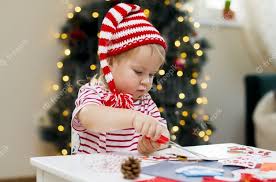 A child wearing a santa hat

Description automatically generated with low confidence